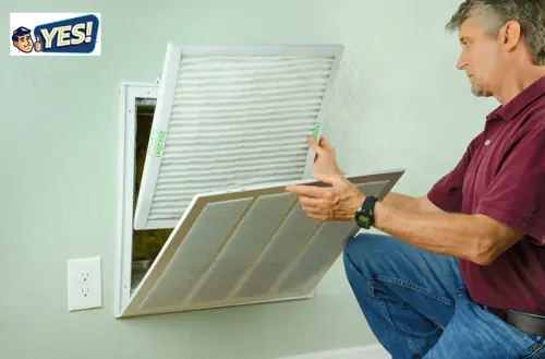 YES! contractor installing air filtration systems in a Utah home.