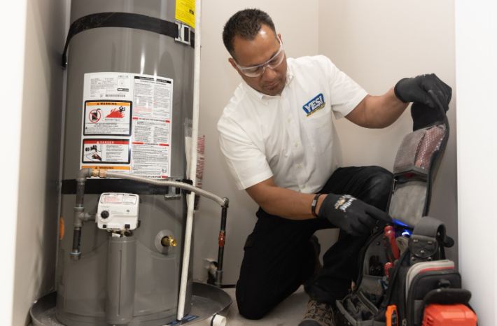 Plumber in Las Vegas, NV, home providing water heater service.