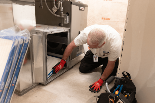 YES serviceman working on slc furnace